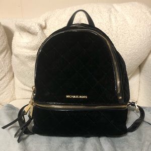 Michael Kors velvet backpack.
